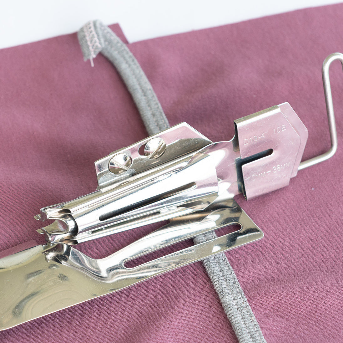 Double fold bias binding foot